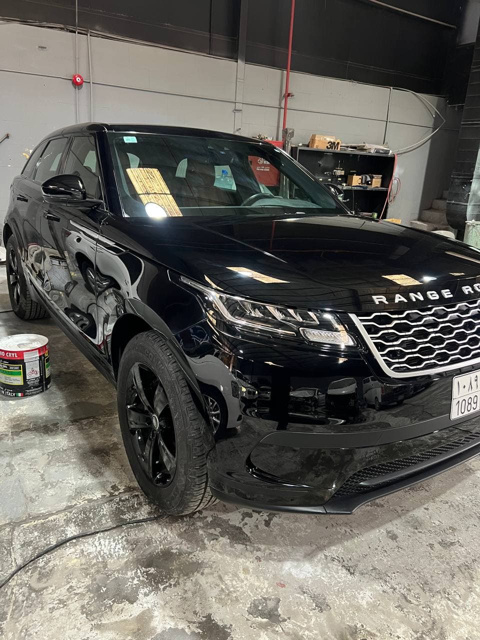 A repaired and shiny red car.